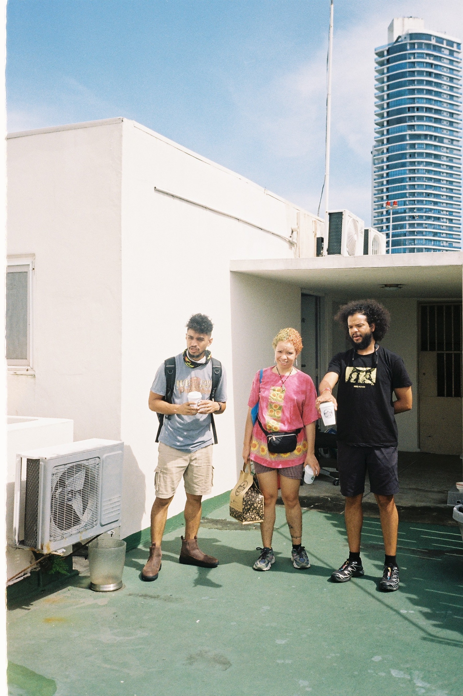 A photo of the film team &ndash;&nbsp;Jez, Shekina and Aquiles &ndash;&nbsp;standing on a concrete building in Panam&aacute; City. 